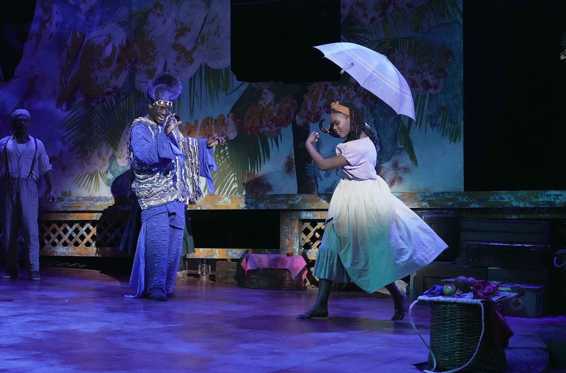 A person carrying an umbrella. 