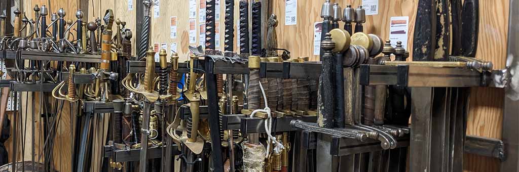 A wall of prop swords.